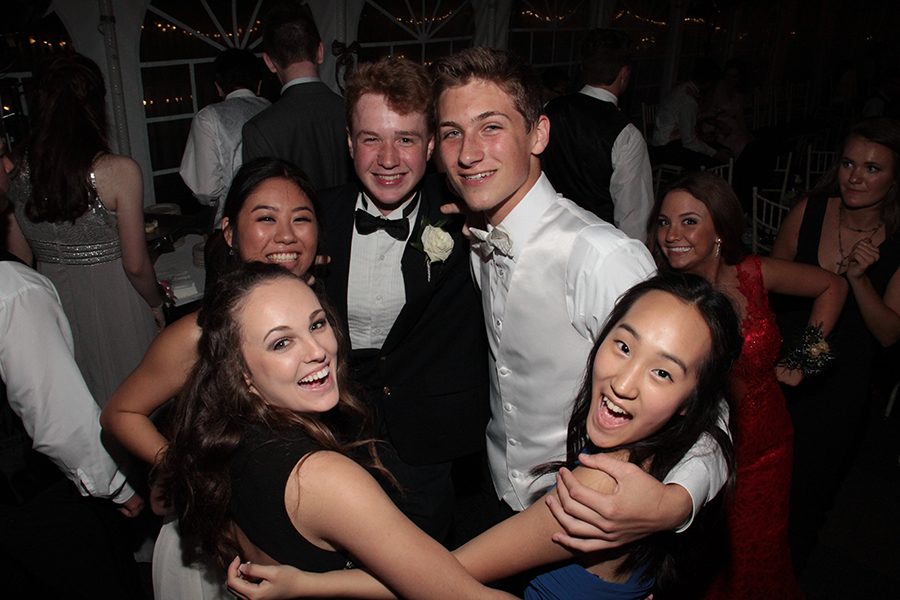 juniors Claire Pellegrino, Annie Doig, Joe Fuller, Gabe Wolf, and Jenny Chai pose for a picture at Prom
