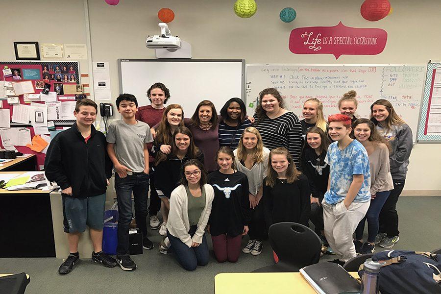 Publications Adviser Debra Klevens poses for the Administrative Team with her fourth hour yearbook class after she was awarded Teacher of the Year.