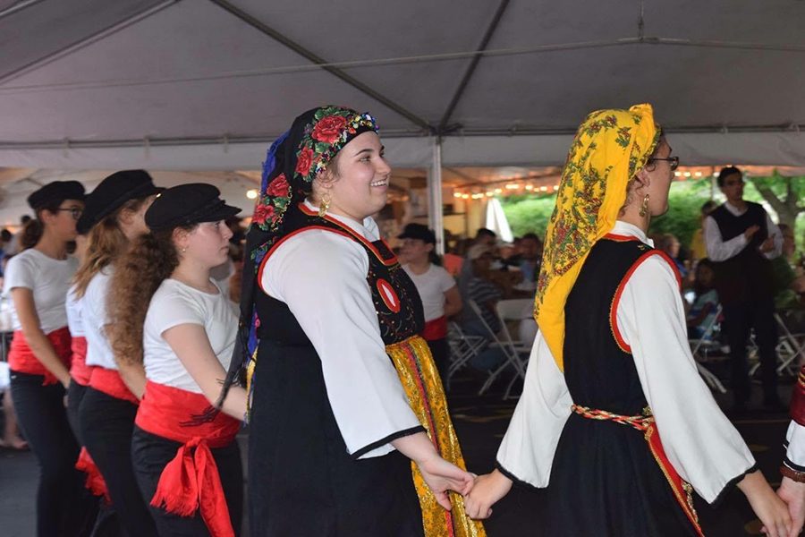 Dancing to the beat of Greek music, sophomore Kristina Humphrey performs at the 2016 St. Louis County Greek Festival.