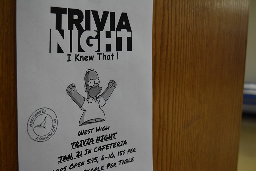 Flyers+featuring+Homer+Simpson+advertise+the+Trivia+night+for+Jan.+21.++