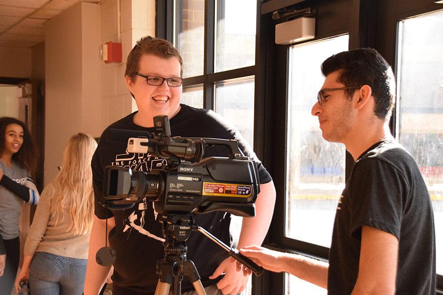 Jared Hardin and Michael Navazhylau record a promo video. 