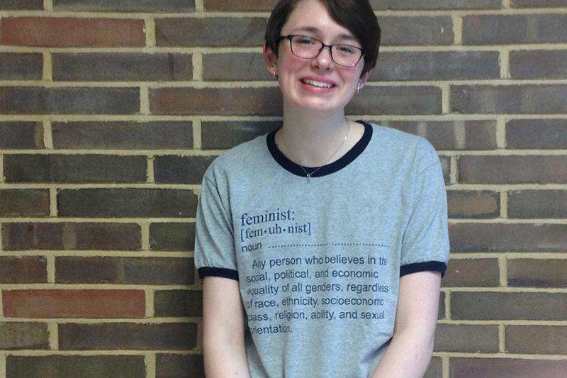 Feminist club Co-President, junior Ann Truka wears her feminist definition shirt to show her support for gender equality and identity.