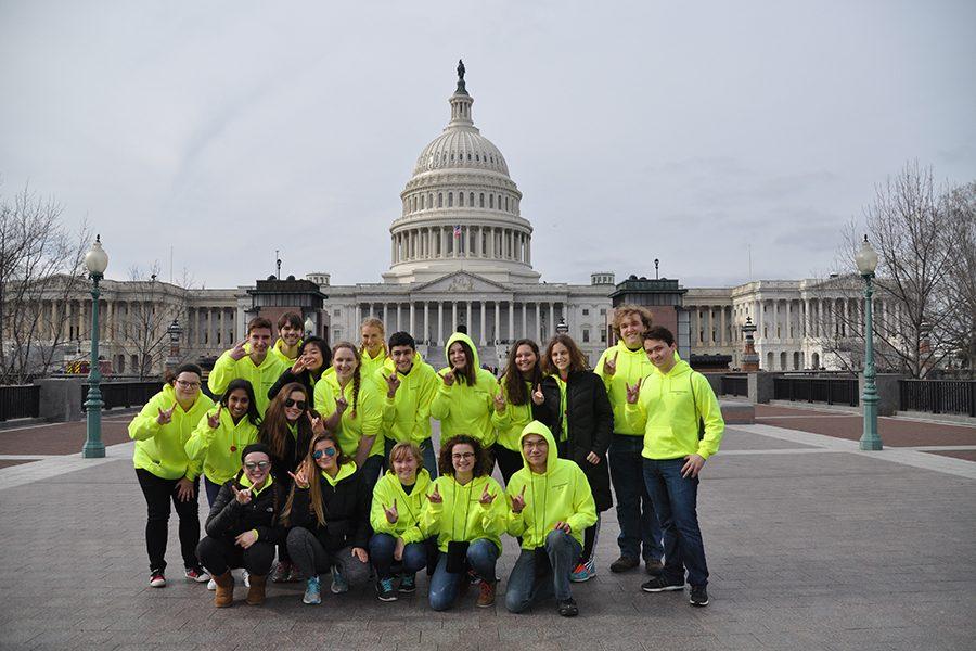 On the way to the Smithsonian Museum during a trip to the inauguration, students stop to take a photo in front of the Capitol Building. ”I really enjoyed seeing all of the monuments at the National Mall at night.  They were all lit up and it made everything just a lot more powerful and dramatic to see than walking by during the day,” Lolley said. 