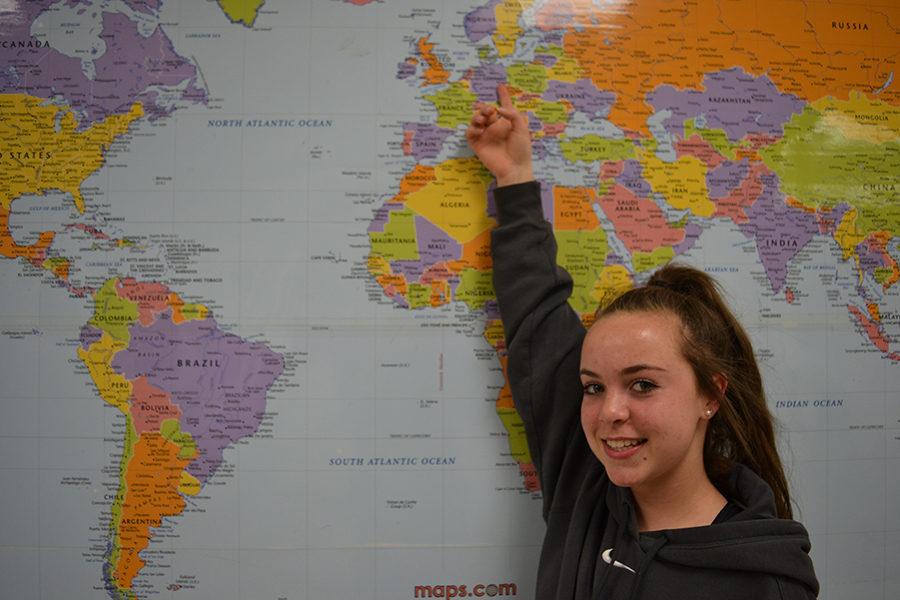Freshman Rachel Fleming spots Berlin, Germany on the map, one of the destinations on the trip. 