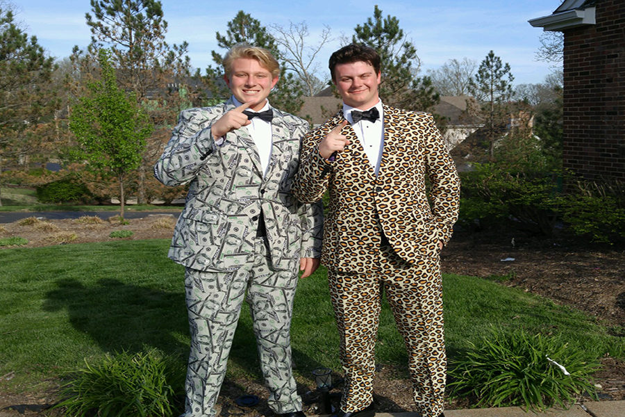 Seniors Andrew Schmidt and Caleb Carswell wear  suits to St. Joseph's Academy Prom.