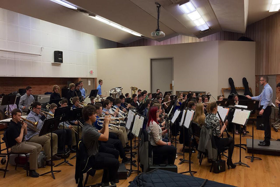 Trying out newly-acquired music techniques, the band runs through one of their practiced songs. The students played four pieces in total under the direction of Brad Wallace.