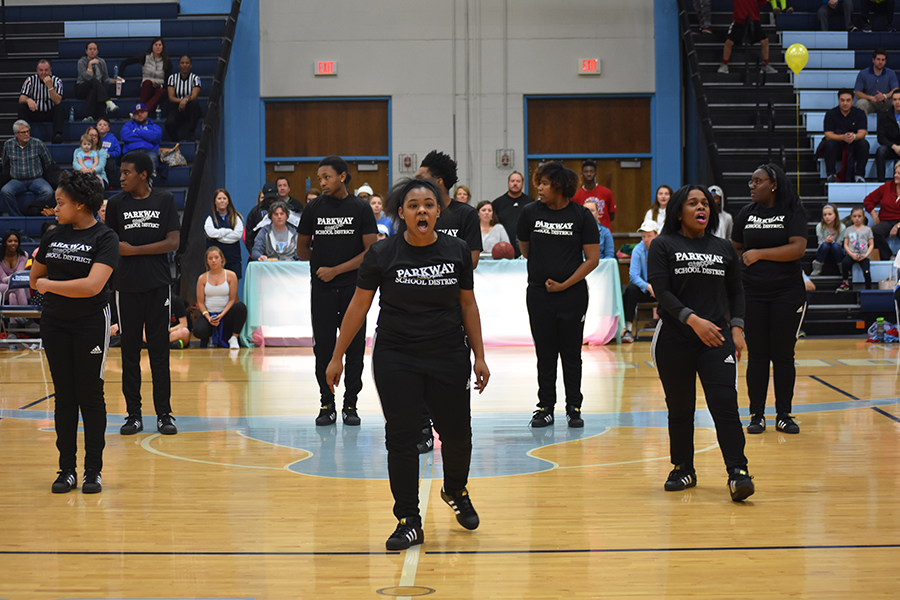 Senior Je’mya Pore screams at the audience and recites a chant in the gym. “When you do chants you have to focus yourself and project your voice towards the audience so they can hear,” Pore said.
