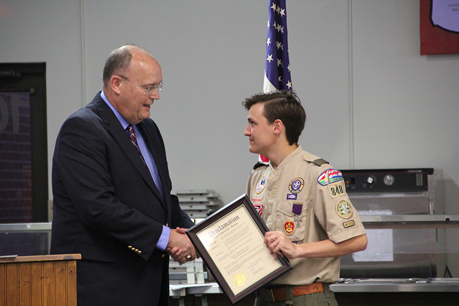 During the Eagle Court of Honor, sophomore Zaven Nalbandian III receives a certificate, commemorating his achievement of earning the rank of Eagle Scout. 
