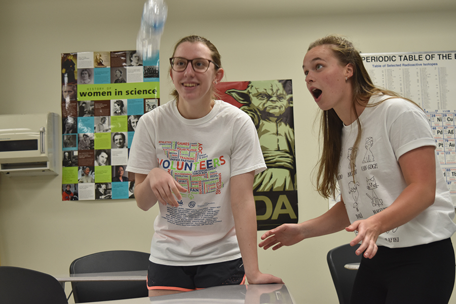 Sophomores Maria Newton and Rachael Newpert flip water bottles, a popular challenge from this school year.
