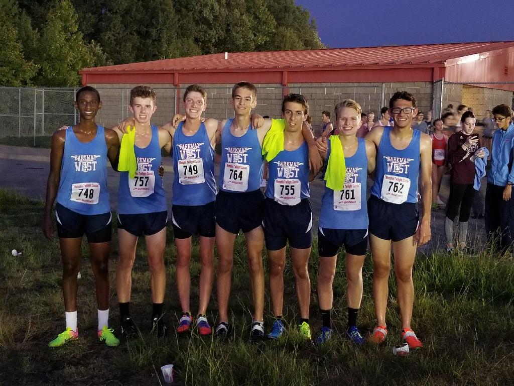 After winning the Memphis Twilight race, the varsity team gathers for a picture.
