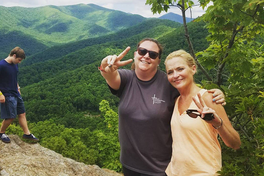 Holding up a peace sign, Sternhagen stands with Reverend Susan Hayes in Montreat, N.C. on a mission trip in June 2017.