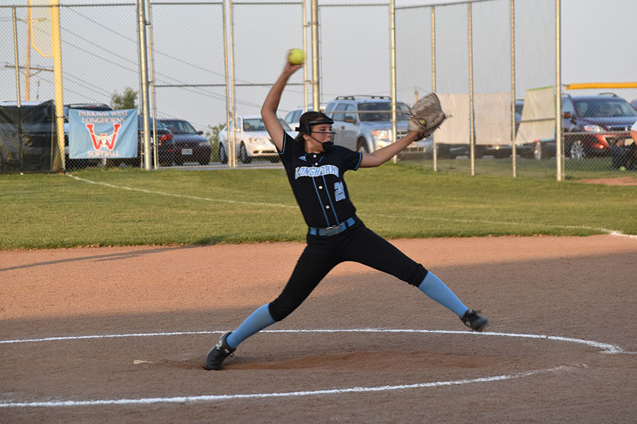 About to release the ball, Wunderlich pitches in a varsity home game. Wunderlich also played shortstop this season. “When I am playing all I am thinking about is the game, and that’s why I love it. Its an escape where I can forget about all the things going on in my life,” Wunderlich said.
