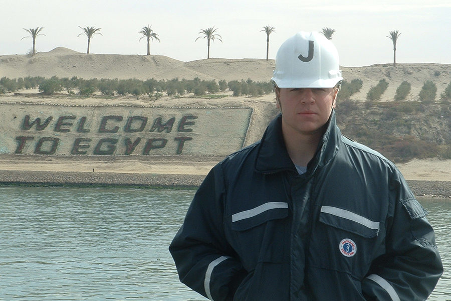 Jaskowiak poses for a picture in the Suez Canal while on a tour of duty in 2006. He was stationed on the U.S.N.S. Bighorn and traveled around Africa on this deployment.