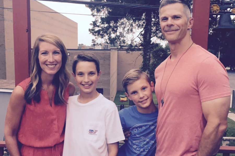 Junior Principal Corey Sink poses with his wife, Molly and sons, Asher and Ryder.