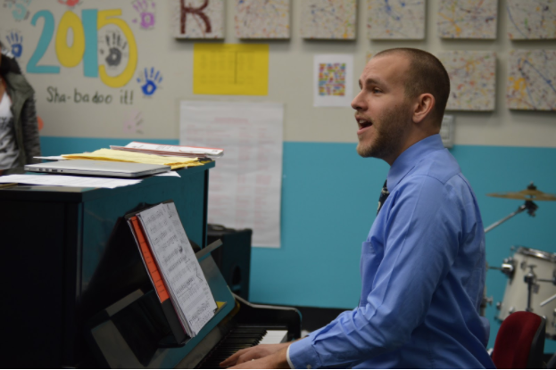 Music teacher Brian Parrish instructs the concert choir on facial expressions. Parrish has been singing since his childhood. “Voice is my primary instrument, always has been, but I’m also a jazz pianist—I can manage my way around that pretty well,” Parrish said. 