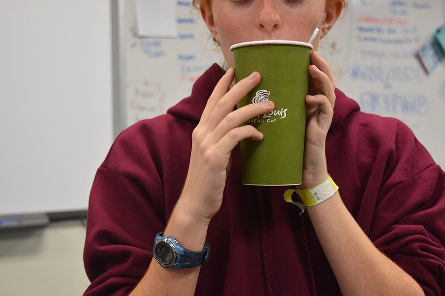 A student drinks coffee during school. Students currently bring coffee to school from places like Starbucks, Panera, and 6 North. I really hope that there’s good coffee. I’m not a Kaldi’s fan, so I think they should get good tasting coffee. We need people to know how to adequately operate the latte machines, junior Natalie Butler said.