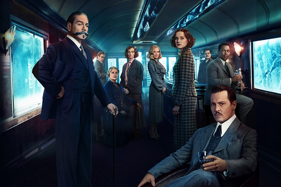 Detective Hercule Poirot, alongside other passengers on the Orient Express, poses in the dining car for a promotional image.