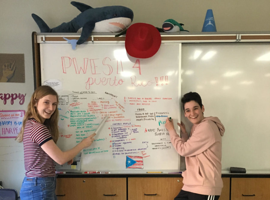 Juniors Harper Stewart and Dani Fischer lead the class in planning the Puerto Rico benefit concert. The concert will be held on Dec 7 and has been planned entirely by Amy Van Matre-Woodward’s Honors Environmental Sustainability class. “Dani and I spearheaded the project, but now our classmates are super involved as well,” Stewart said. “We have people designing logos, doing research and slideshows and figuring out set up.”