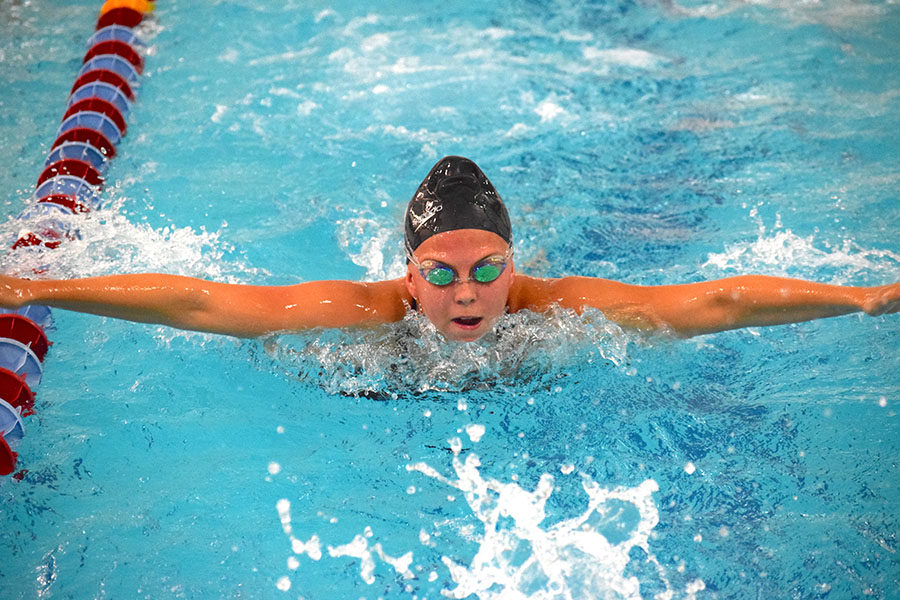 Senior Sophie Vietor performs a butterfly stroke during practice on Nov. 27. 
“[Doing a variety of strokes] helps give me a chance to improve all of my strokes and makes the sets more interesting instead of doing freestyle or one stroke the whole practice,” Vietor said.
