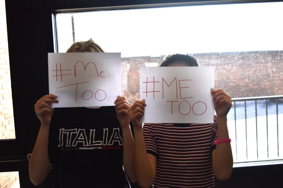 Holding signs stating, '#MeToo', students express support for the movement encompassing the media. 