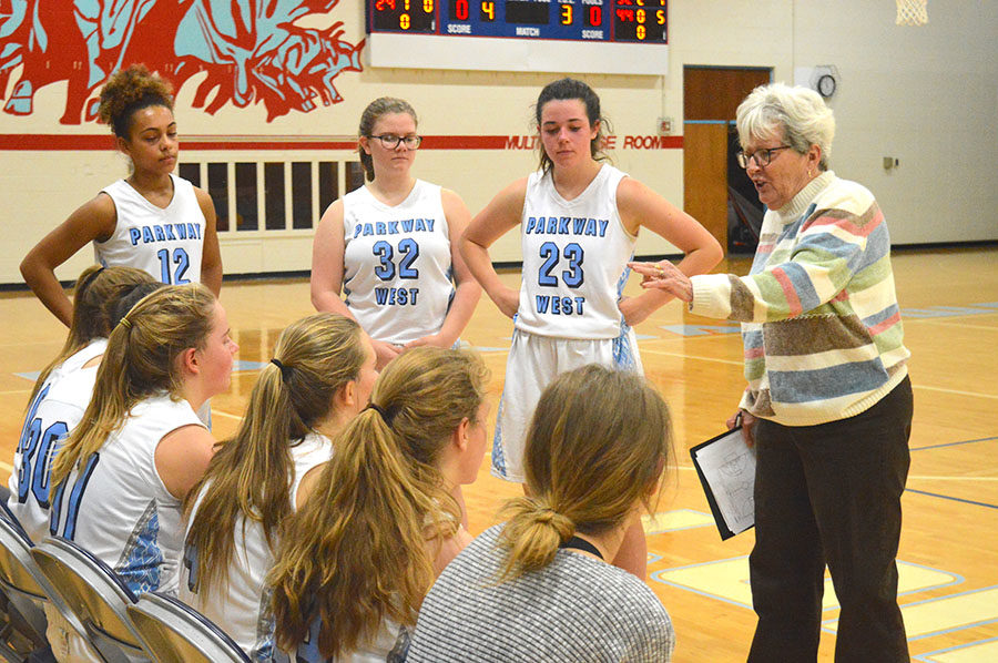 Freshmen+basketball+coach+Peg+Schane+provides+feedback+to+her+players+during+halftime+against+St.+Dominic%2C+Jan.+10.+The+freshmen+basketball+team+has+a+record+of+10-0-0.+%E2%80%9CI+feel+like+coach+Schane+has+helped+us+a+lot+to+be+undefeated+at+this+point+in+the+season%2C%E2%80%9D+freshmen+girls+basketball+team+captain+Leah+Selm+said.