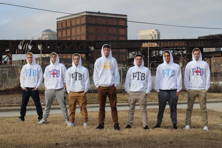 Seniors Brett Schade, Jackson Glisson, Austin Balestra, James Banks, Tyler Ramatowski, Drew Benoski and junior Will Patton pose for a photo. The boys gathered for a photoshoot, and this is currently the main picture on the website. "I mean it’s not really anything crazy you know just a local business just starting out selling  sweatshirts, but once we get our website going and a little more brand recognition I think we could really have potential to expand," Glisson said.