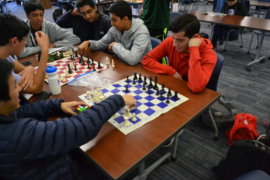 Paul Gipkhin is planning his strategy of attack in a chess game against Jason Wan. Gipkhin memorized all his opening moves and plans to use his specialty. “My favorite opening is the Sicilian Defense opening,” Gipkhin said. “It is a powerful opening and it is my specialty. I still need to perfect it so I have to practice different variations.” 