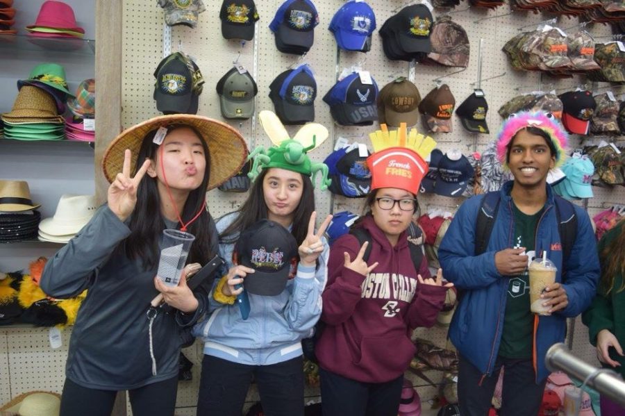Senior Cheryl Ma, junior Maddie Cooke and seniors Anna Chen and Haran Kumar pose with hats from Ozarkland. “We stopped at Ozarkland and bought silly hats, and I bought a Chili’s hat. Ozarkland was midwestern and had all of these funny signs,” Cooke said. “One sign that we saw said ‘American by birth, rebel by choice,’ and that was a joke we kept saying to each other the whole time [at Jeff City].”