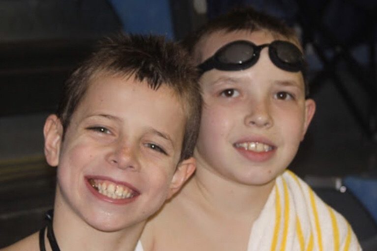 2016 graduate Drew Bonnett and the late Joe Ross pose for a picture at a Parkway Swim Club swim meet. Bonnett and Ross swam together for many years and grew up as best friends. “Joe was a light of joy and laughter,” Bonnett said. “I loved him and respected him deeply.”