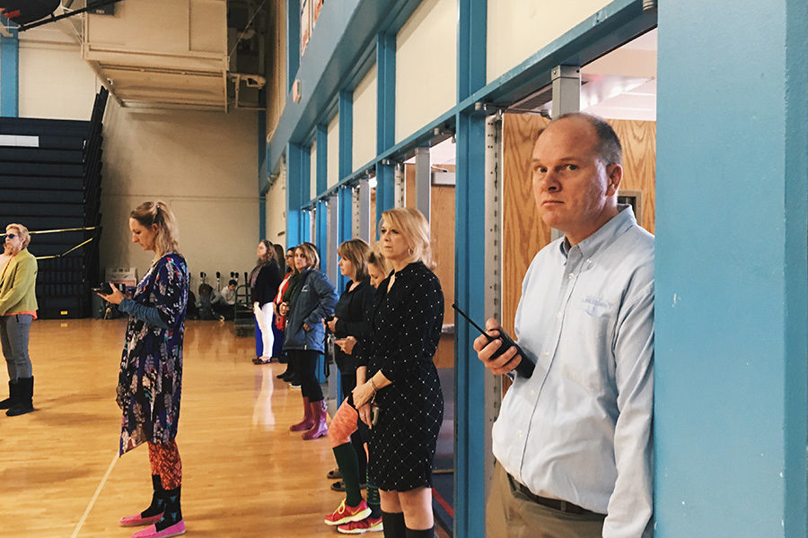 Administrators and teachers stand at the doors of the main gym, observing the demonstration. Other Parkway schools allowed students to walk out of the building, but West students were warned of detentions when they tried to leave. “When we tried to leave the actual building teachers told us to stop or we would get detentions, so we went out another door and stood along Clayton road, willing to face the consequences,” junior Maria Newton said.