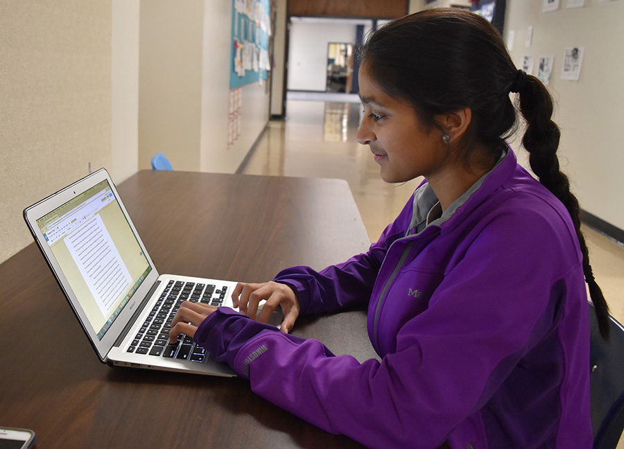 Typing on her laptop, Shah looks over the work she has done. Her research surrounds ophthalmology, and she has worked with graduate students studying the effect of the eclipse on retinas. “I got involved because my dad got me in contact with a few people, but then I reached out to more people at [Washington University] to see if I could help them work,” Shah said.