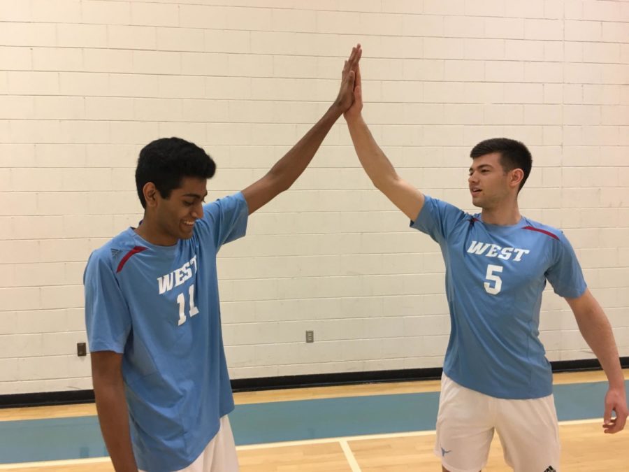 Kotaru and Senior Andrew Eickman celebrate after scoring a point. The season is quickly approaching, and the team is ready. I wouldn’t say I’m really nervous about anything, I would definitely say I’m just more excited to start playing games, and just to start getting better, Koratu said.