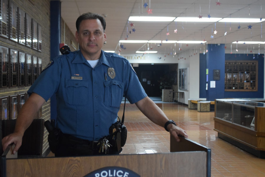 Standing at the building entrance, school resource officer Scott Scoggins works with local police and Parkway officials to keep the school safe. Scoggins worked with the district and administration to be sure that our school was safe today. 
