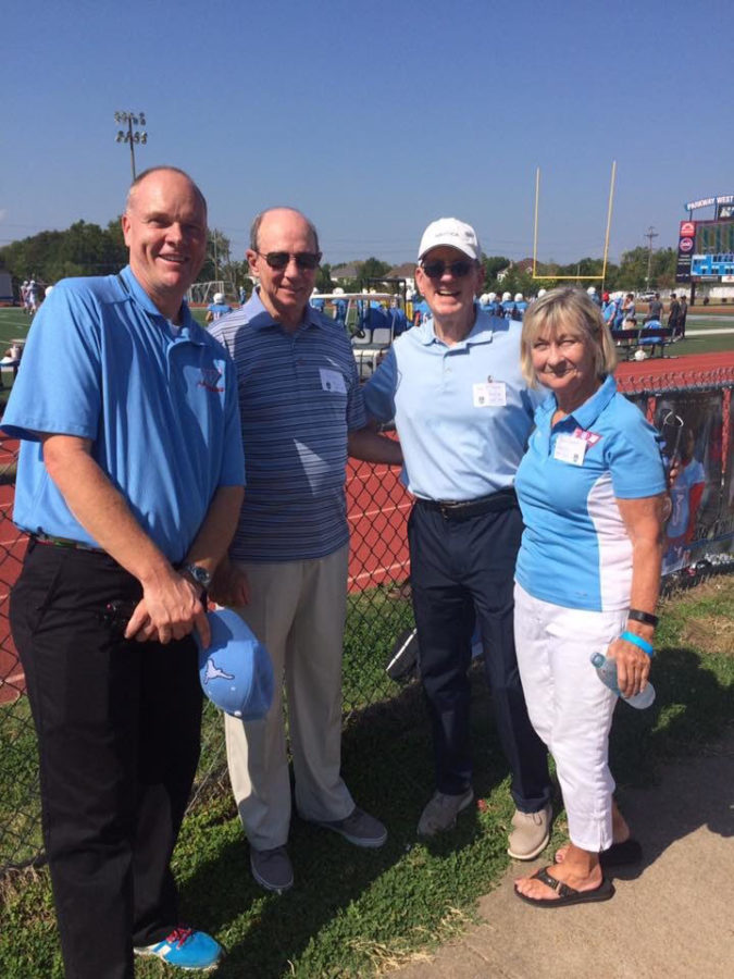 Bill Byrd (center left) stands with current principal Jeremy Mitchell, and former principals Dave McMillan and Beth Plunkett at West’s 50th anniversary football game and celebration. Byrd had continued to stay connected to the West community even after leaving his post as principal in 1987 through his three children’s enrollment and attendance to football and basketball games. “We currently have a granddaughter [sophomore Susie Seidel] at West and enjoy attending her activities and listening to her West stories.  I feel very honored and fortunate to have been a part of West High for the past 50 years,” Byrd said. 