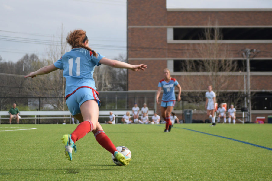 Junior Bella Hatzigeorgiou glides into a pass. The game against Nerinx Hall took place on the opposing team's home turf. "It was probably the hardest game of the season so far," Hatzigeorgiou said. "They're the number two team in the state right now."