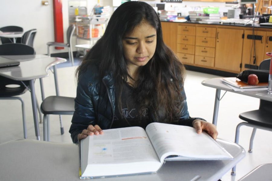 Senior Salomi Inje reads a science textbook to further her medical knowledge. Inje volunteered for four years to work towards her dream of becoming a pediatrician. “I’ve always loved kids; I actually wanted to be a teacher for a few years. I also loved healthcare, and something about it felt like my calling,” Inje said. “Pediatrics was the perfect blend between the two, and I truly think it’s a job I can’t get bored of or regret.”