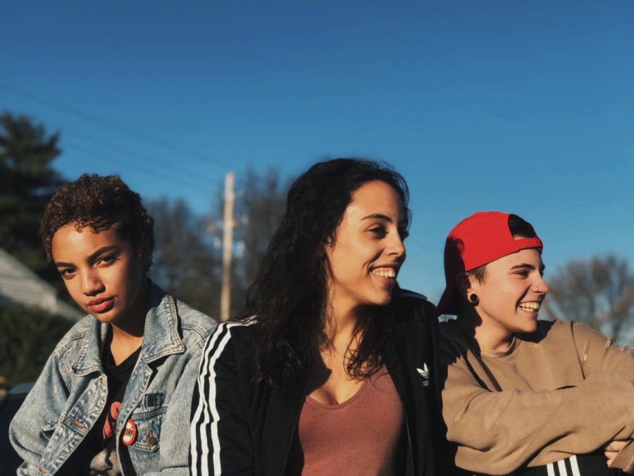 Hanging out at a park, Fern Ridge junior Tori Owens, alumna Adina Flowers and sophomore Tony Morse laugh together. Whenever Tony feels upset or down, he goes to his friends who are his support system. “Now that I’m trying to get better, I feel like I can go out and do things I want with my friends, but sometimes I’ll be freaking out the whole time,” Tony said. “I’ll be with my friends, and they’ll be like, ‘Tony, calm down.’ I realized that having them there with me while that’s happening, while the anxiety is going out of control, definitely helps me.”