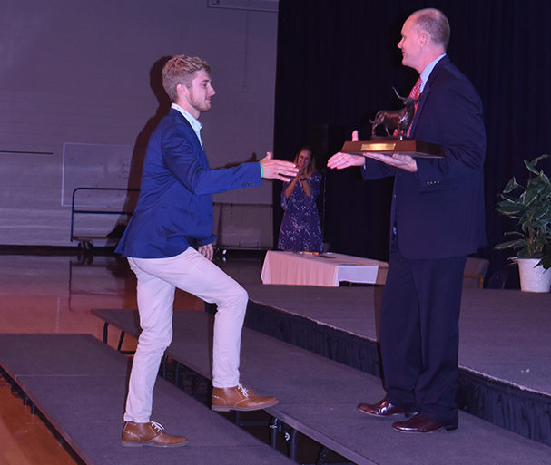 Accepting the 2018 Founder's Award from Principal Jeremy Mitchell, senior Daniel Loaney reflects on his experiences at West. The Founder's Award is given to the student who best exemplifies what West students stand for: good character, academics, school spirit and is the highest school honor. “I was overwhelmed, it was a surreal moment to look out and see four years of my life had gone by. I’ve loved this place, and being here," Loaney said. "It really meant a lot to me to see how I have impacted the school. I wanted to make the most of my time here at West so to be recognized was surreal and overwhelming.”