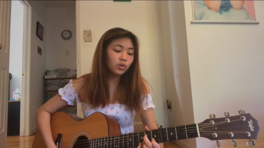 Debuting her song “You and Me,” junior Charlize Chiu plays the guitar for her first live recording on Youtube. Chiu spent almost three months working on additional verses and instrumental parts. “The most challenging aspect of running social media accounts is finding ways to stay motivated and please everyone on each platform, including myself,” Chiu said. “Sometimes people don’t like the same things as I do, and that makes things hard.”