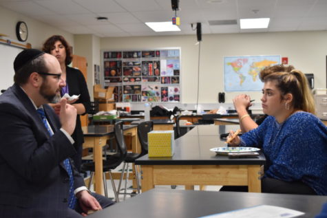 After the Tree of Life synagogue shooting in Pittsburgh Saturday morning, Jewish Student Union member seniors Lexie Bratton and Derek Isle discuss their emotions with Rabbi Yitzchak Staum. Students shared their disbelief for the fact that antisemitism still exists in 2018. “We can respond with kindness to the hate by educating others,” Bratton said. “The majority of hate stems from lack of knowledge, and through JSU and other programs we hope to educate our peers to stop the hate.”