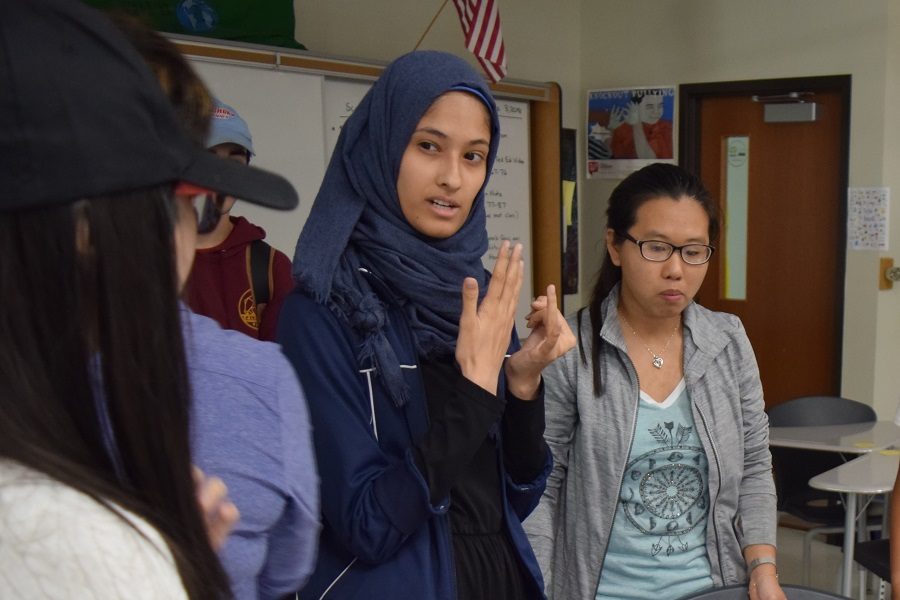 Senior Yasmine Abdulla talks to senior Vannia Ung about future plans for the Asian Appreciation Association. AAA celebrates the different holidays that its members are familiar with. “Surprisingly most of these holidays fall on the day of the meeting,” Abdulla said. “The plan is to bring food related to that [holiday].”