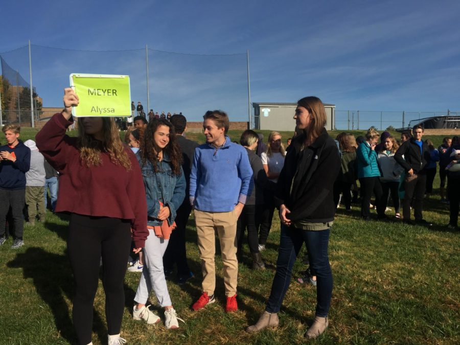 Students stand in the field behind the school during a fire drill Oct. 24 after taking an hour of the day to practice emergency drills. This day of practice followed a real fire alarm Oct. 23.
