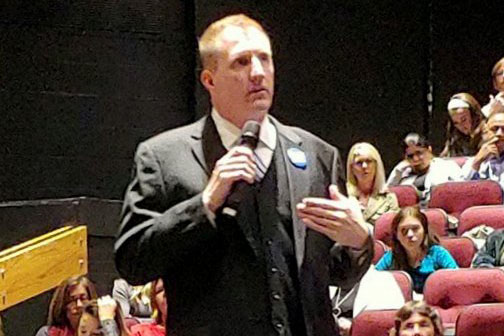 Speaking to the crowd, Libertarian Party Larry Kirk shares his positions and ideas. Kirk and Cort VanOstran participated in the Parkway School District Student-Hosted Candidate Forum. Photo by Kirk Campaign