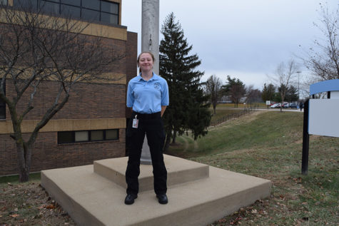 Standing tall, junior Makenna Rugani poses in her South Technical High School (South Tech) uniform. Rugani attends South Tech in pursuit of one day becoming a police officer. The media makes some people believe we are the enemy, when in fact is is the opposite, Rugani said. 