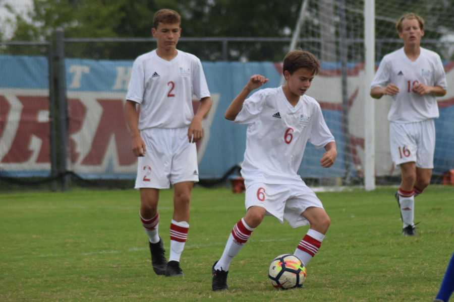 Cutting around an opponent, freshman Ethan Geiger dribbles the ball down the field. Geiger and the C-team were the first C-team in boys soccer history to have a winning record. The team always worked really hard at practices and in games, Geiger. We got fourth in the tournament which was really cool, because we have a good team chemistry and are always just joking around with each other and just enjoy playing soccer.