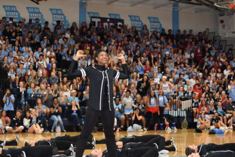 Standing alone, junior Aaliyah Weston completes a dance routine while her poms teammates drop to the floor. The team performed with the entire school watching at the Homecoming pep assembly Sept. 28. “Once I got all that applause it was like, ‘Oh, I do matter and I’m a black girl making a change at Parkway West,’” Weston said.