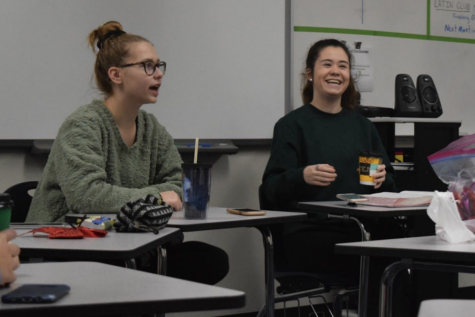 Sitting together in the front of the class, junior Katie Solodar and sophomore Arden Dickson discuss strategies to deal with mental illness at the second official meeting of Every Mind Matters. They created the club to give students a place to talk about their struggles and ask for help. “Our main goal is to give students a community where we can talk about mental health because a lot of times we don’t have a platform where we can talk about it safely,” Dickson said. “We really wanted to provide a better environment for students, and discussion based activities will help with that.”