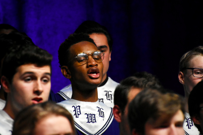 Singing “The First Noel,” senior Malik Penton harmonizes with Concert Choir at the Winter Concert Dec. 11. Students from grades seven through 12 performed at the 50th anniversary of the Winter Concert. “Being in Concert Choir, after eight years of choir, is one of the most special experiences of life. Wherever I go, I’ll always have the memories with my friends to hold onto. When I transferred junior year to Marquette and later Saint Charles West High School, I made sure choir was on my schedule because music is something I can’t live without,” Penton said. 
