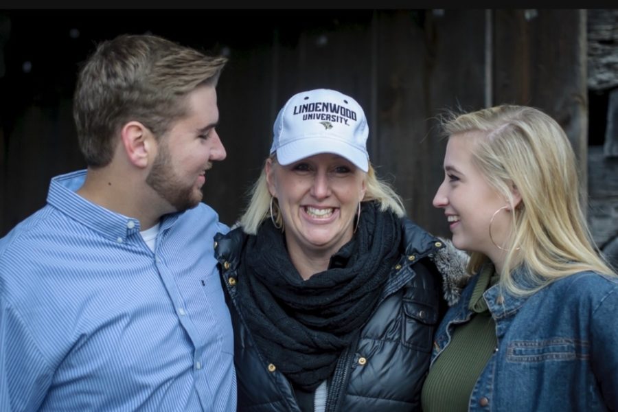 Seniors Jacob and Kara Swihart laugh with their mother Jenny before she is scheduled to have brain surgery. The school community helped fund the surgery and continue to support the family. “I have received a lot of support from my coaches, peers and people all over the community, Jacob said.
