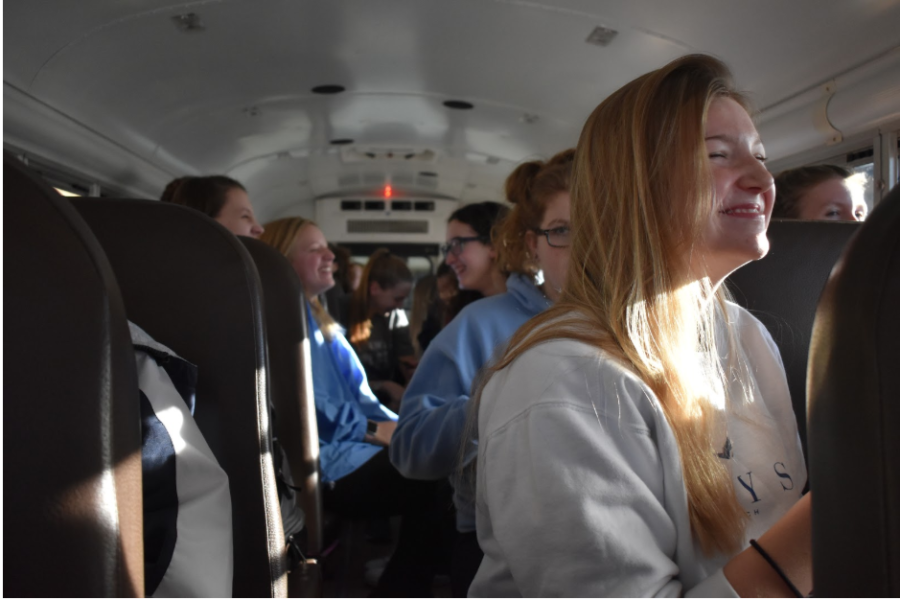 4:07 p.m.
Laughing on the bus ride to a swim meet at Lindbergh High School, senior Alyssa Theroux enjoys the comradery of her teammates. On the way back to school after every meet, the girls swim and dive team sings a song once they reach Clayton Road. “My favorite part is when we sing the chant: ‘Clayton Road, take me home to the place where I belong…’” Theroux said. “Bus rides are always fun, they’re a great place for team bonding.”
